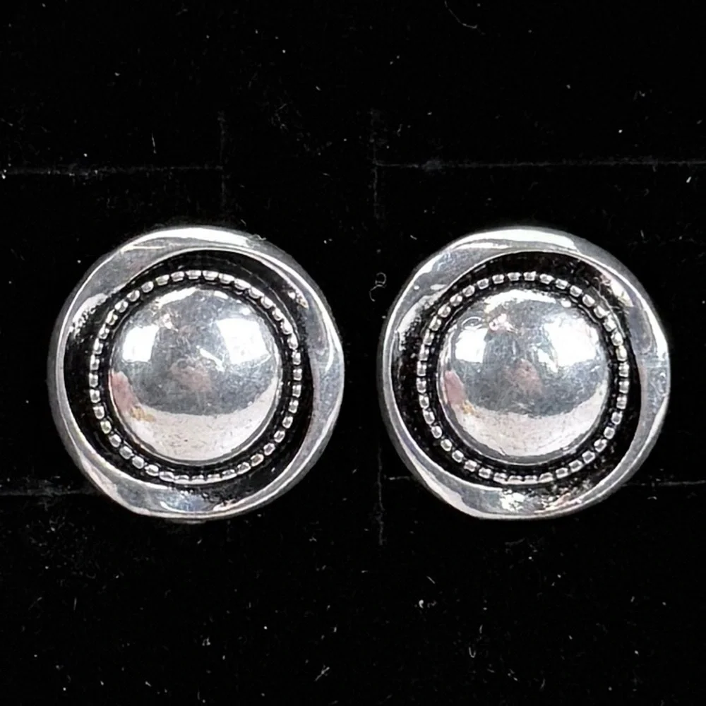 Vintage Silvertone round weighted clip on earrings